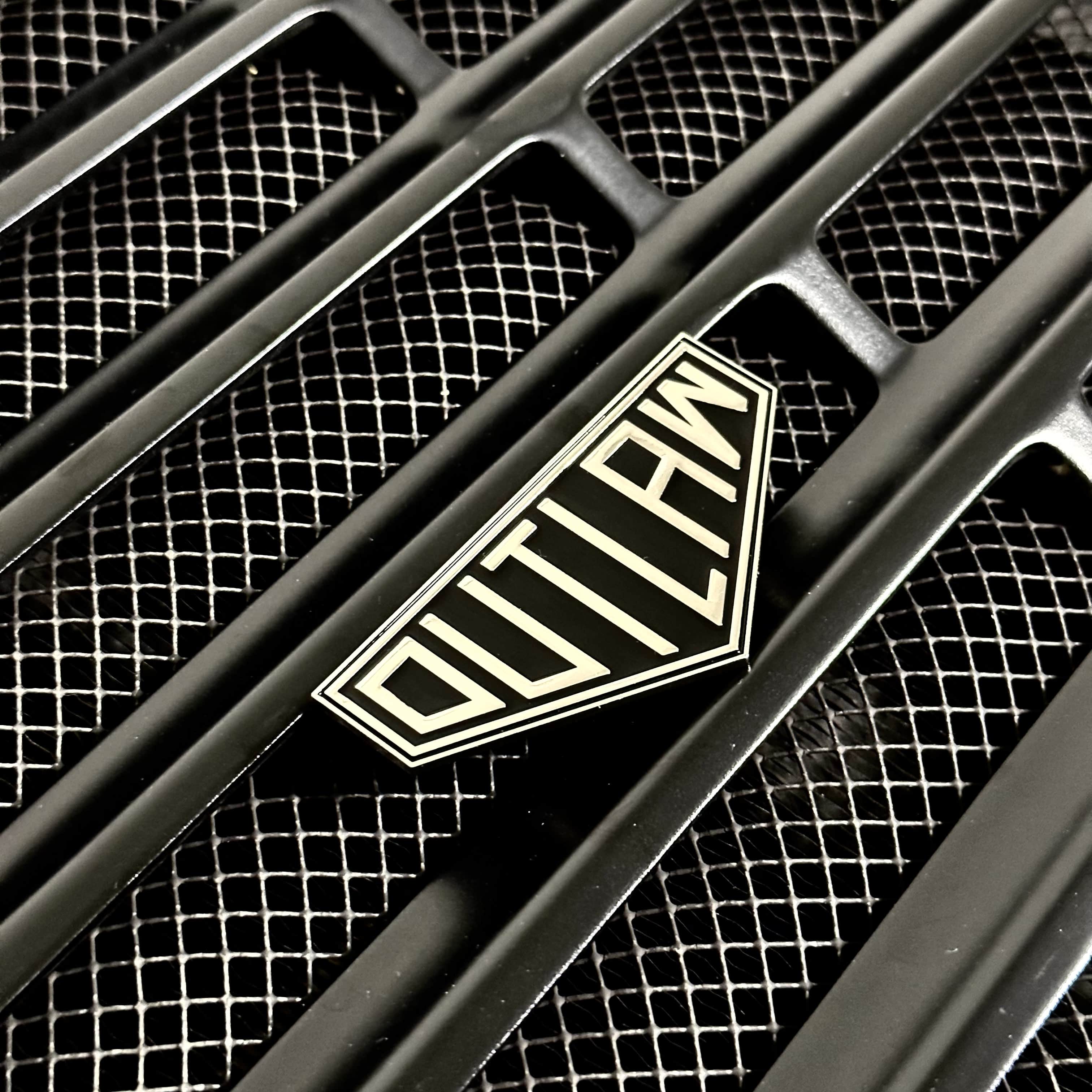 outlaw enamel car grill badge on porsche turbo
