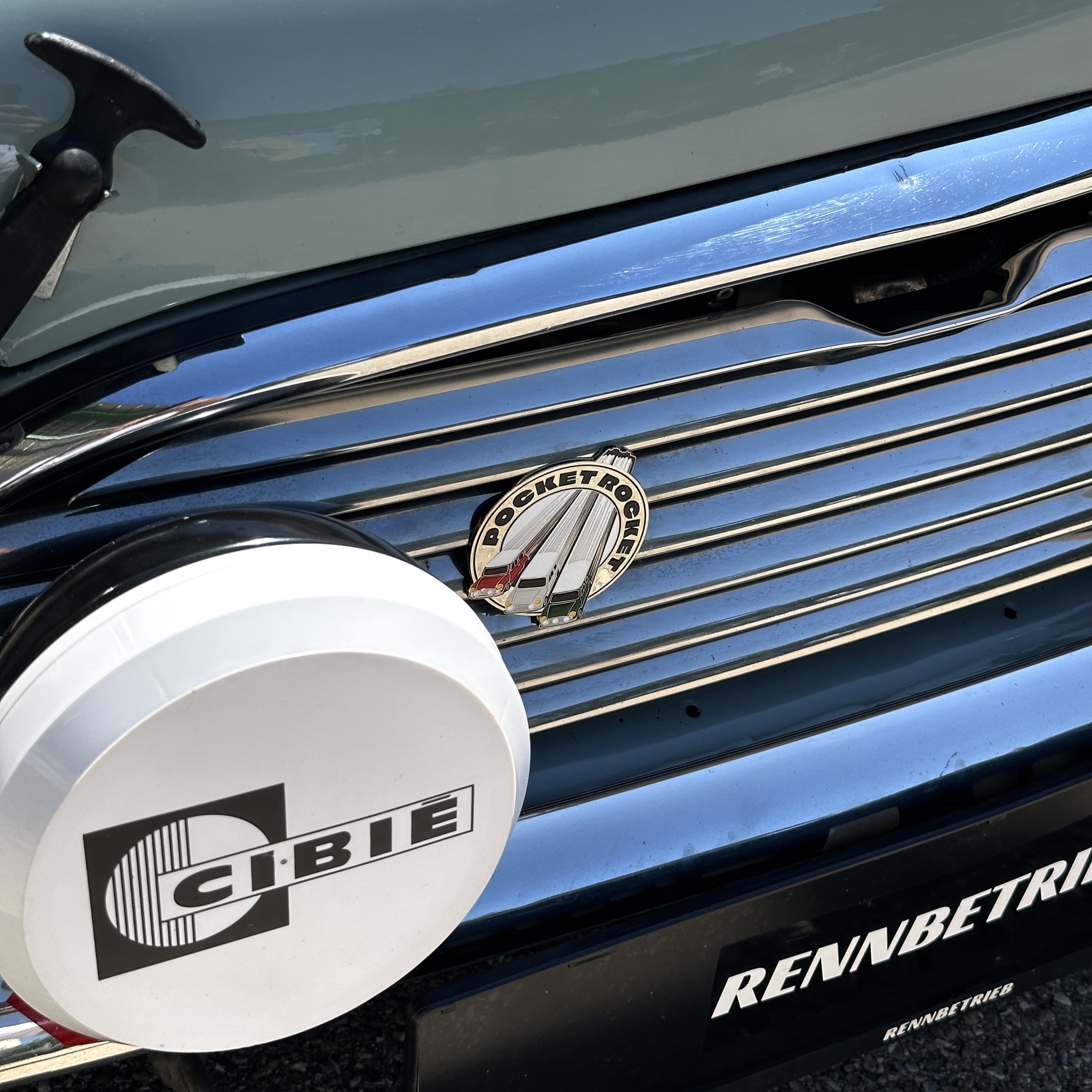 mini cooper in blue with enamel grill badge from rennbetrieb