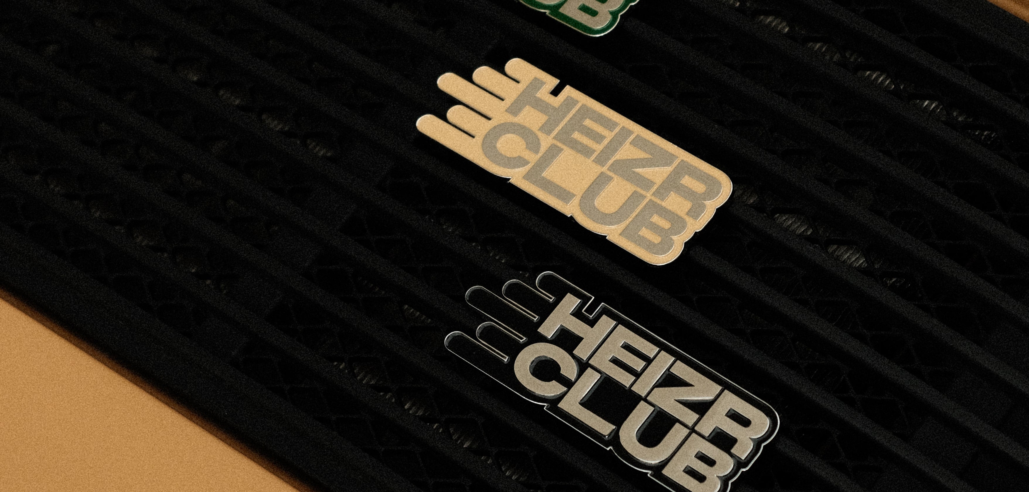 RENNBETRIEB x HEIZR Club Enamel car grill badge on porsche