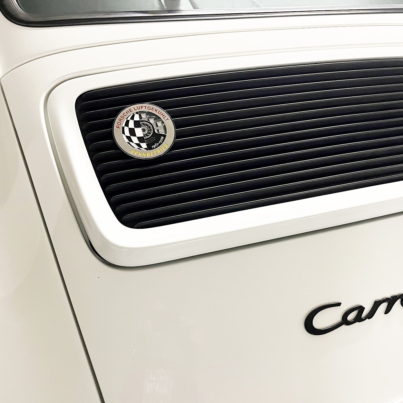 white porsche 964 carrera 2 from back