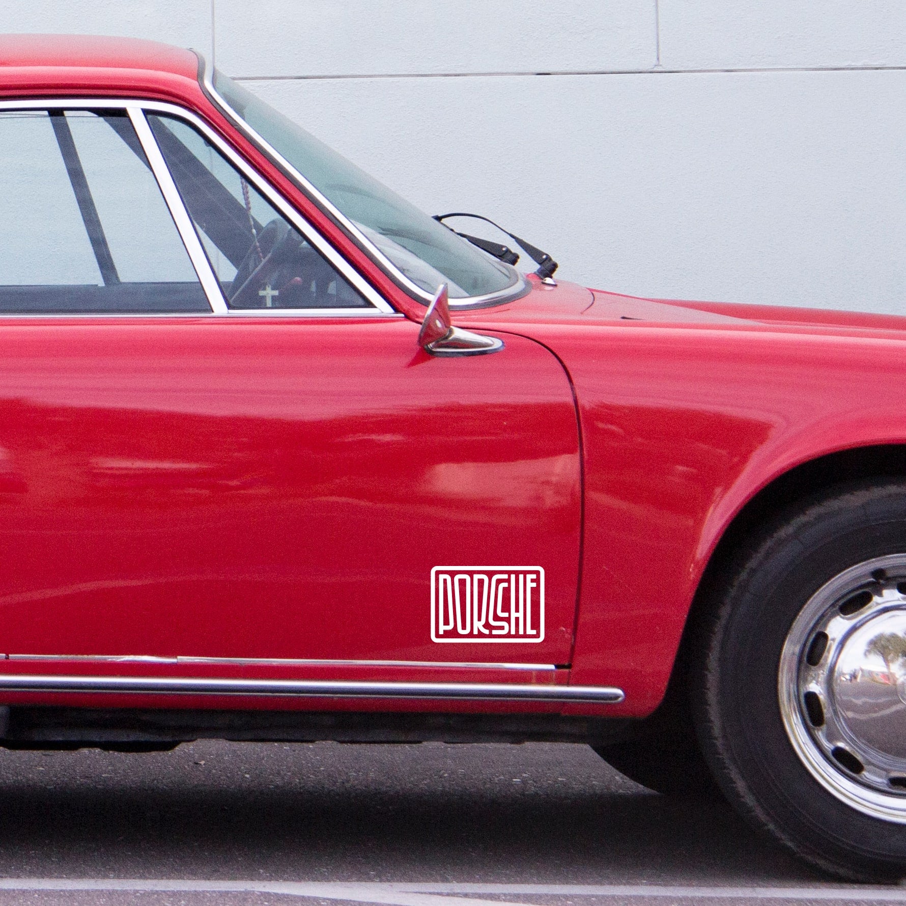 porsche font on red porsche 911