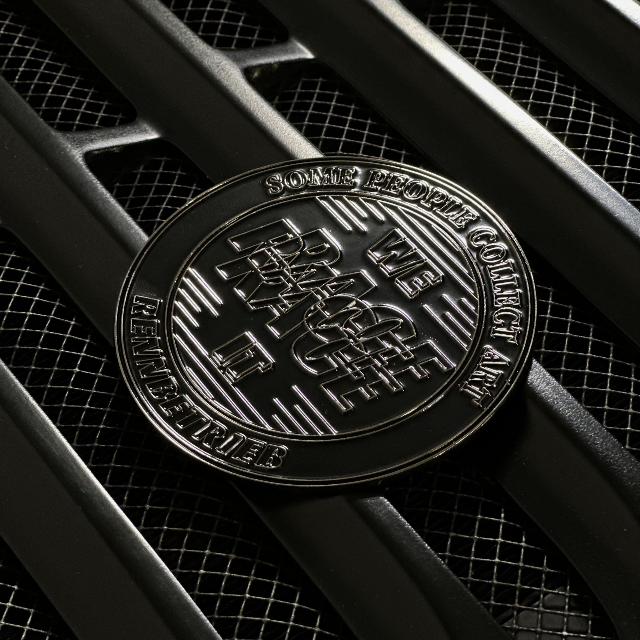 some people collect art we race it black enamel car grill badge on porsche 930 turbo grill