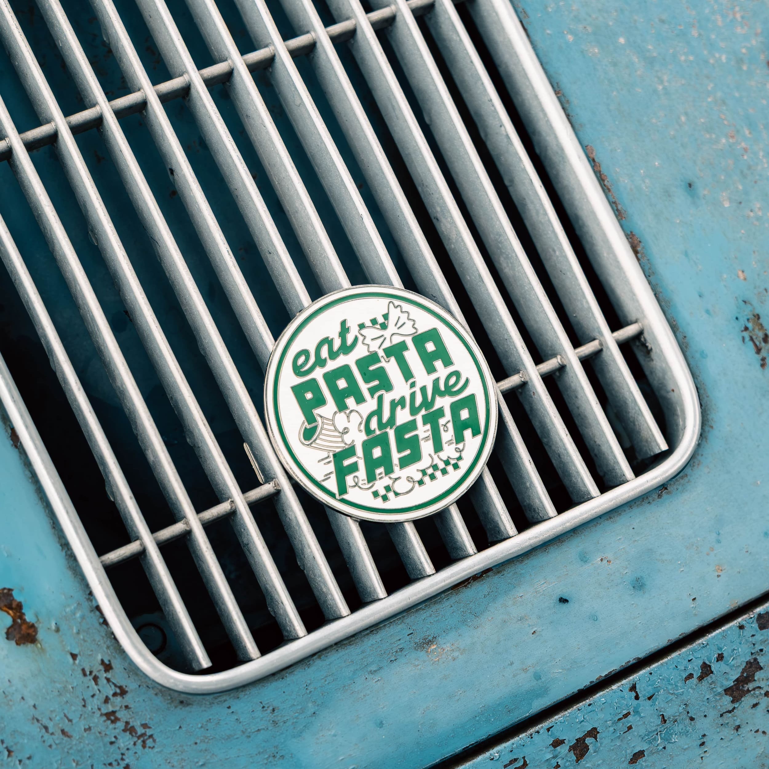 eat pasta drive fasta enamel grill badge on porsche 356
