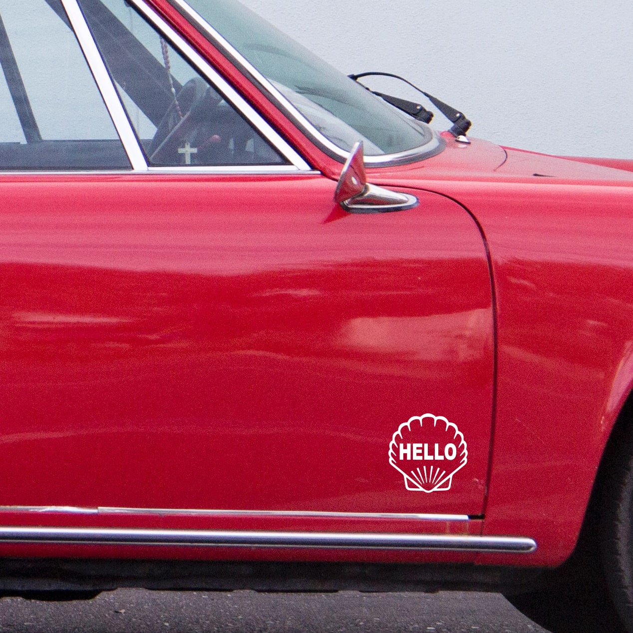 porsche 911 in red with white shell sticker