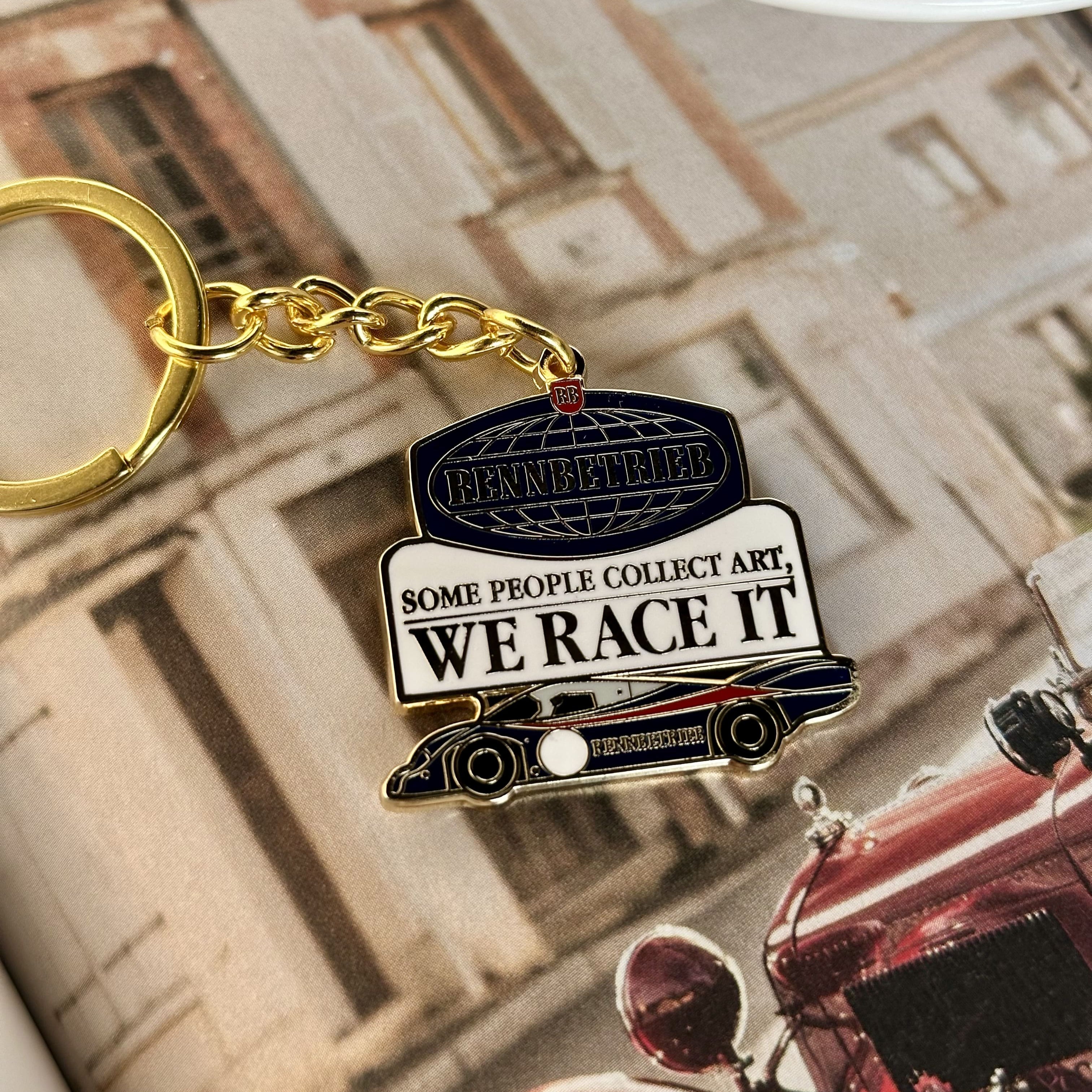 rennbetrieb enamel keychain some people collect art we race it
