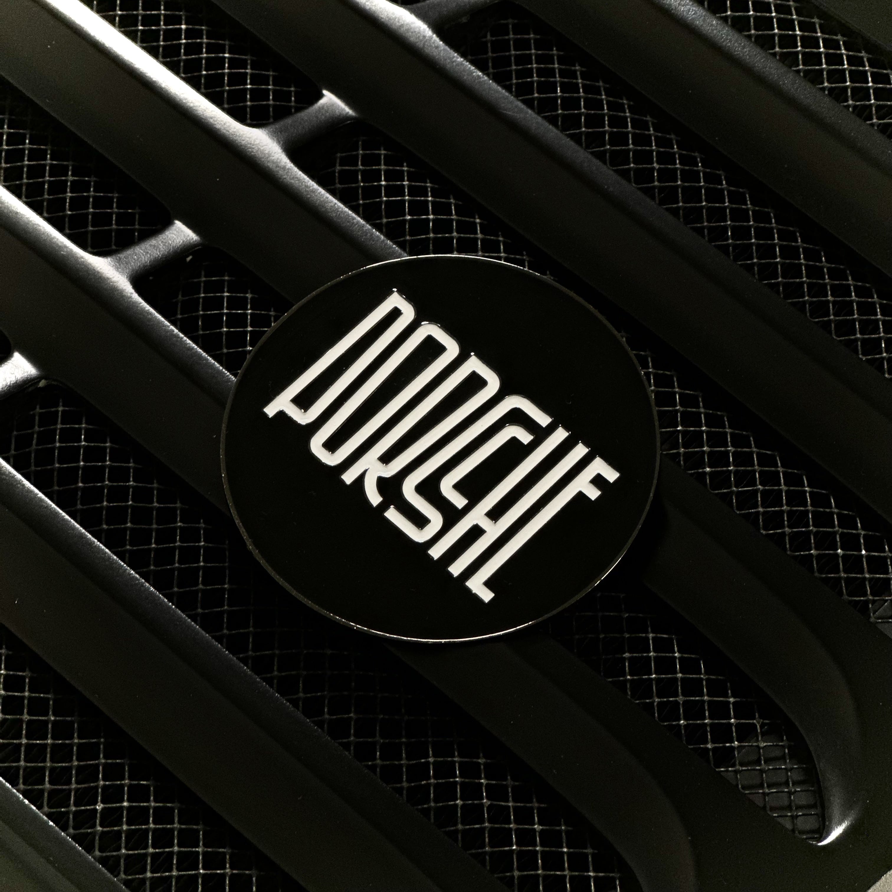 rennbetrieb black enamel badge on porsche