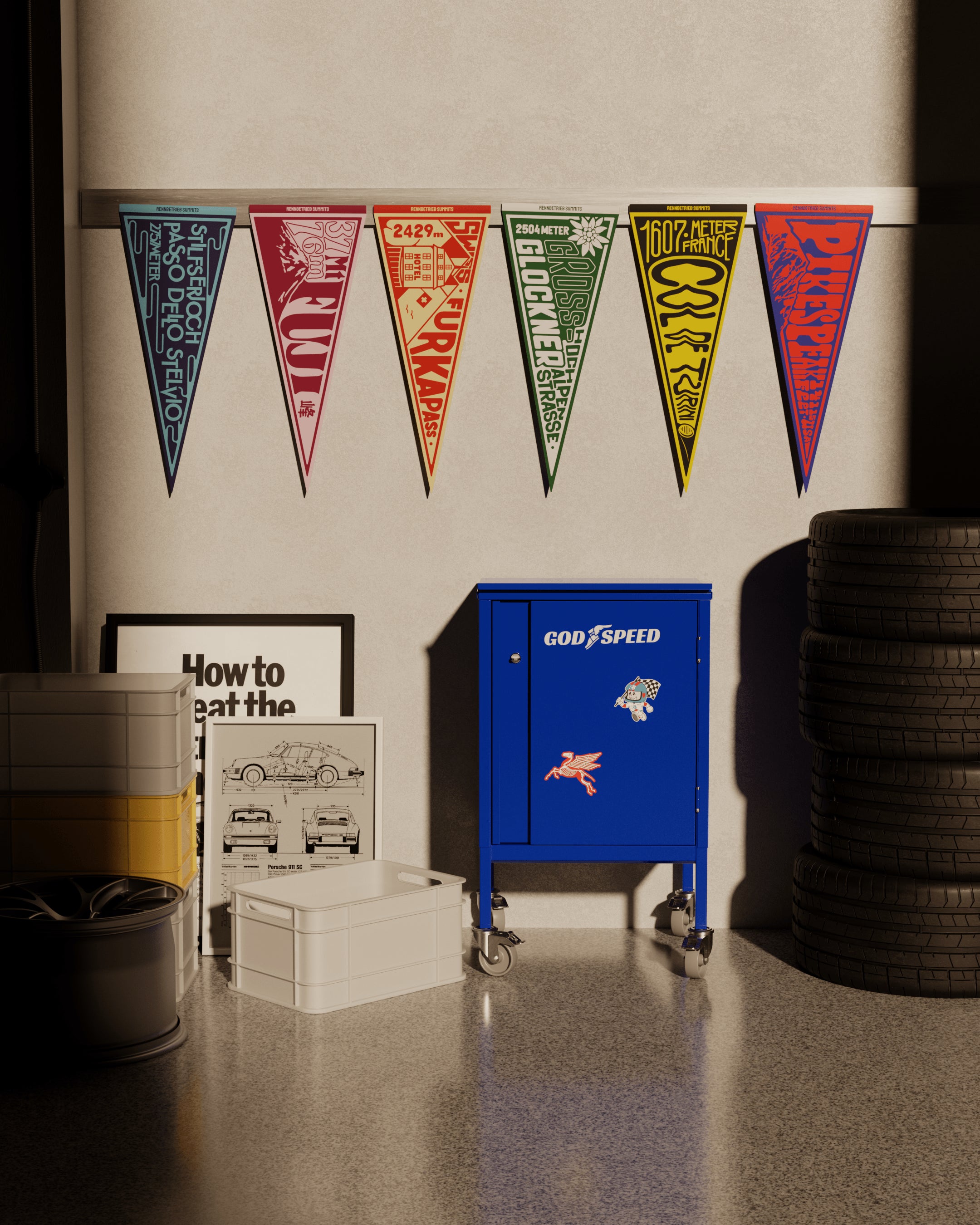 Garage setting with a blue 'Godspeed' cabinet, colorful pennants, and tires.